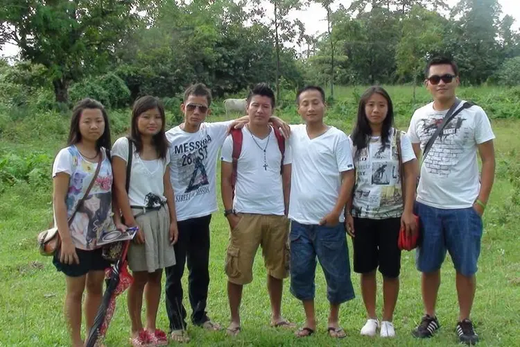 Group photo, 7 people in a line